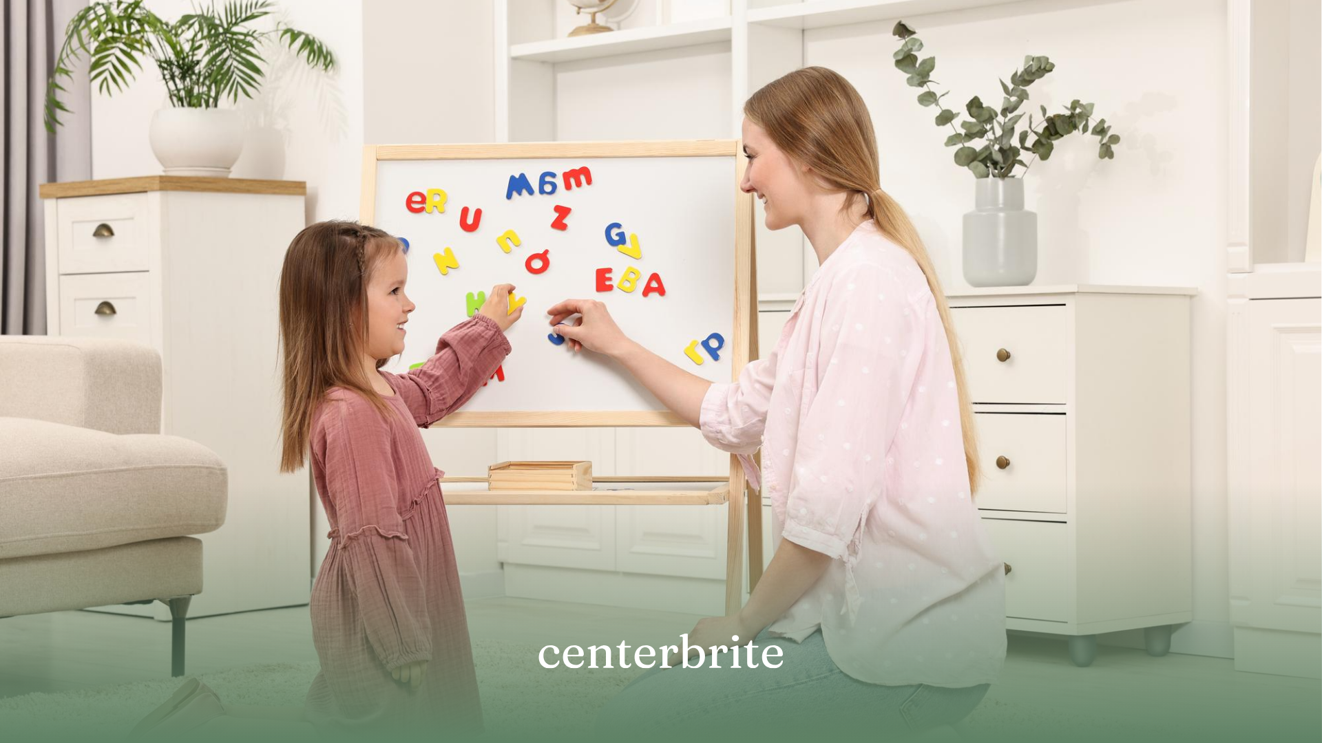 A BCBA and a child pointing at a magnet letter on a whiteboard during ABA therapy